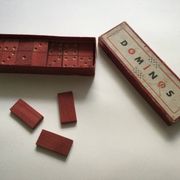 Red wooden dominoes game from the 50s old toy