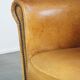 Stately, sleekly finished, comfortable sheepskin armchair