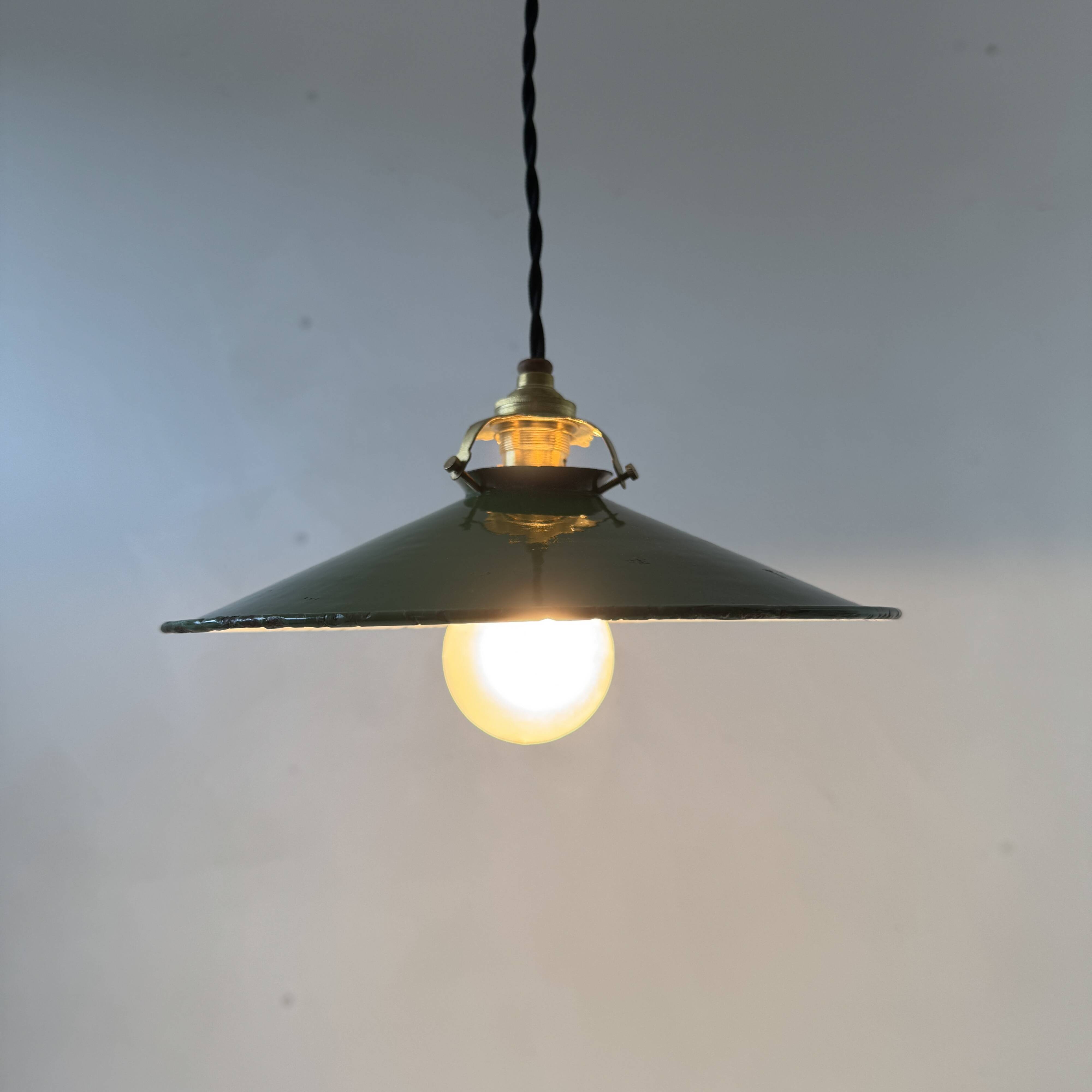 Old conical industrial pendant light in green enamelled sheet metal
