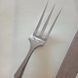 Serving cutlery in silver metal