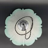 Frosted glass flower pendant with a water green edge.