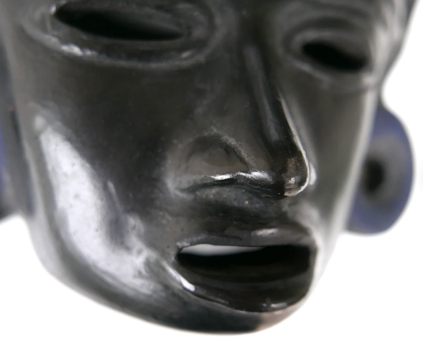Black Mayan mask in terracotta, 70s