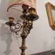 Pair of lamps in gilded brass, red toile de Jouy shades.