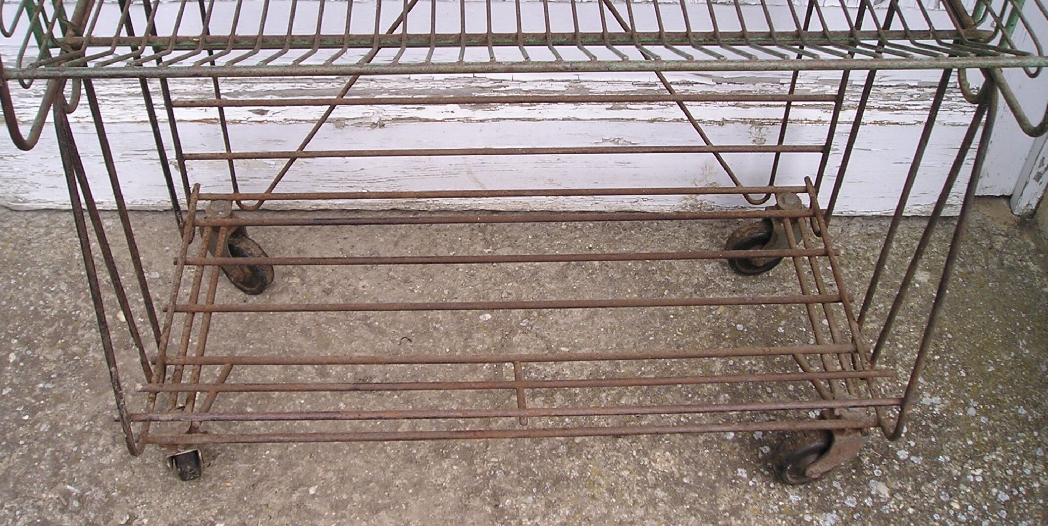 Metal display on wheels with 4 removable baskets 1960/70