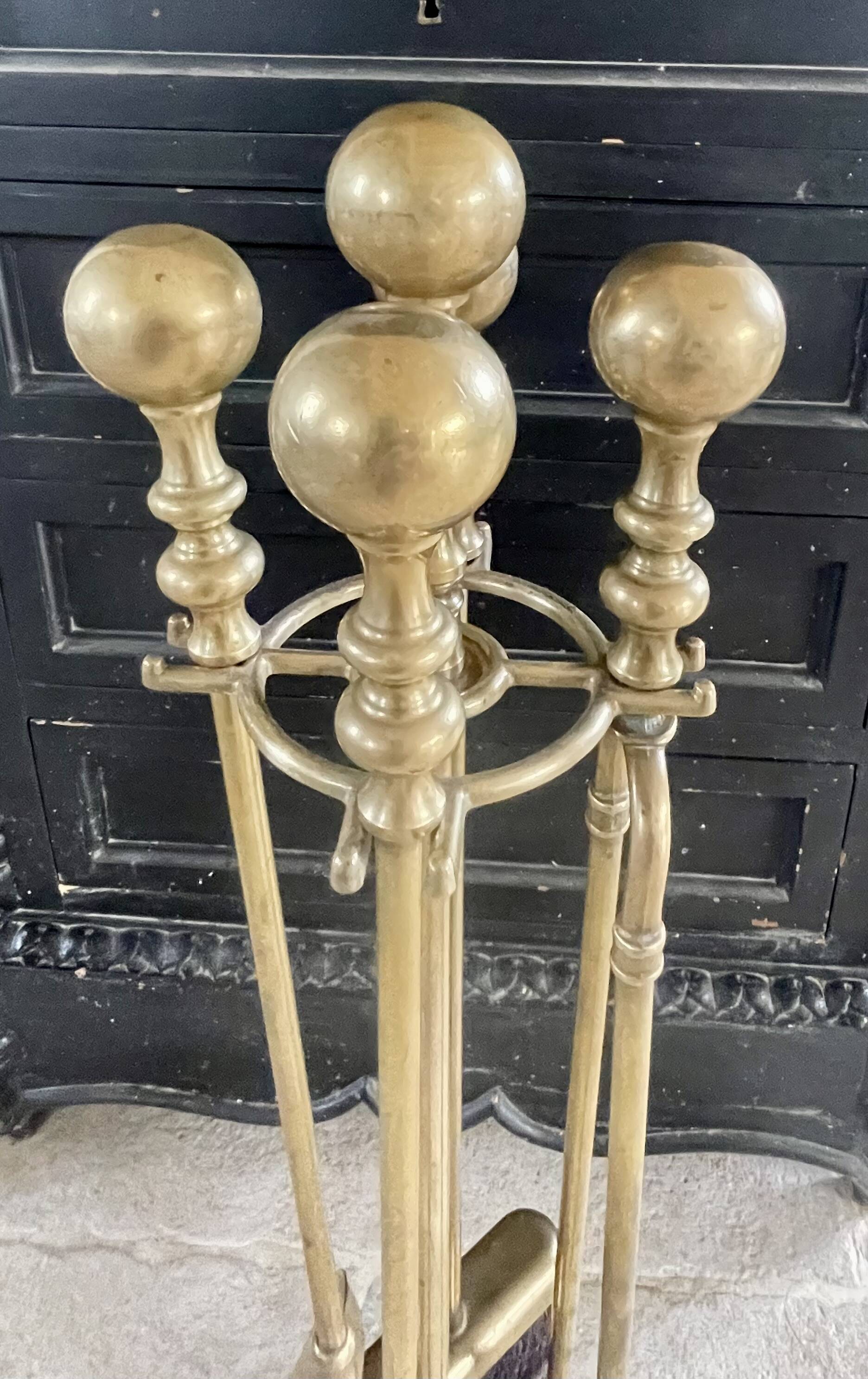Brass fireplace accessory set with vintage stand