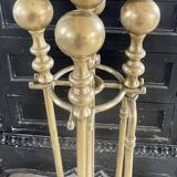 Brass fireplace accessory set with vintage stand