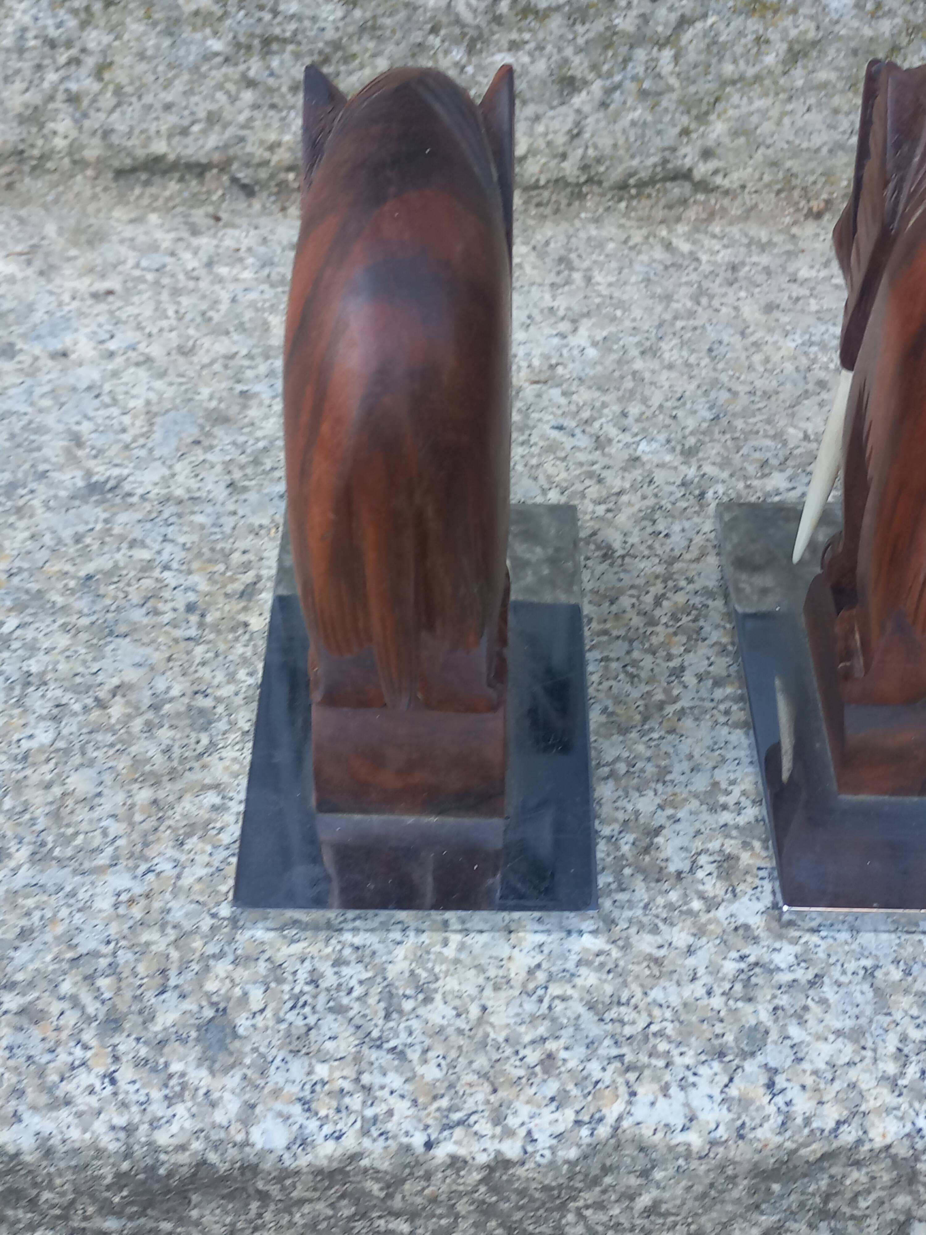 Pair of Art Deco elephant bookends in rosewood with chrome base.