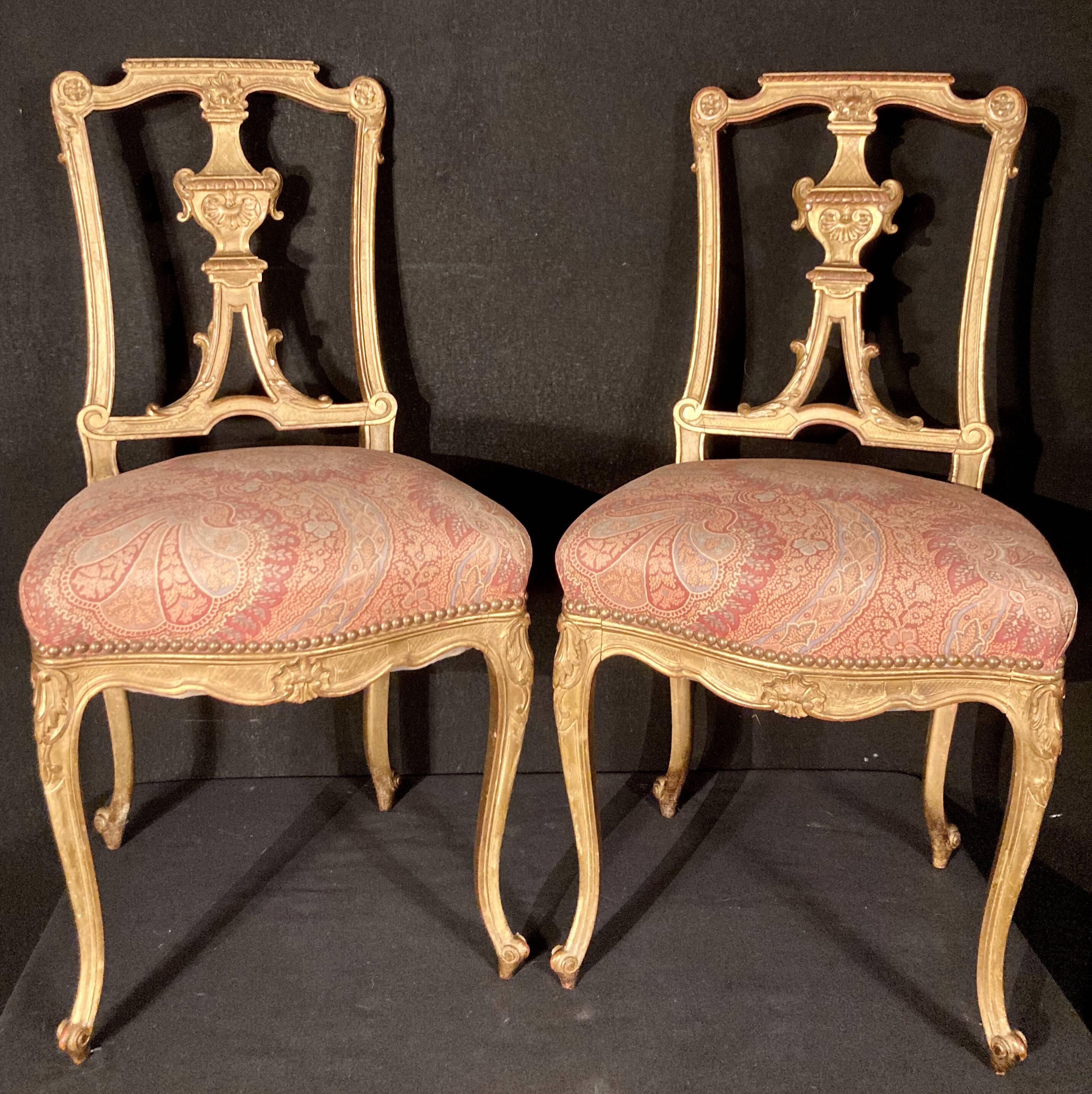 Pair of gilded wooden chairs