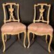Pair of gilded wooden chairs