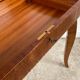 Small marquetry pedestal table with key storage