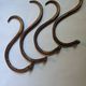 Set of curved wooden coat hooks in Thonet style.