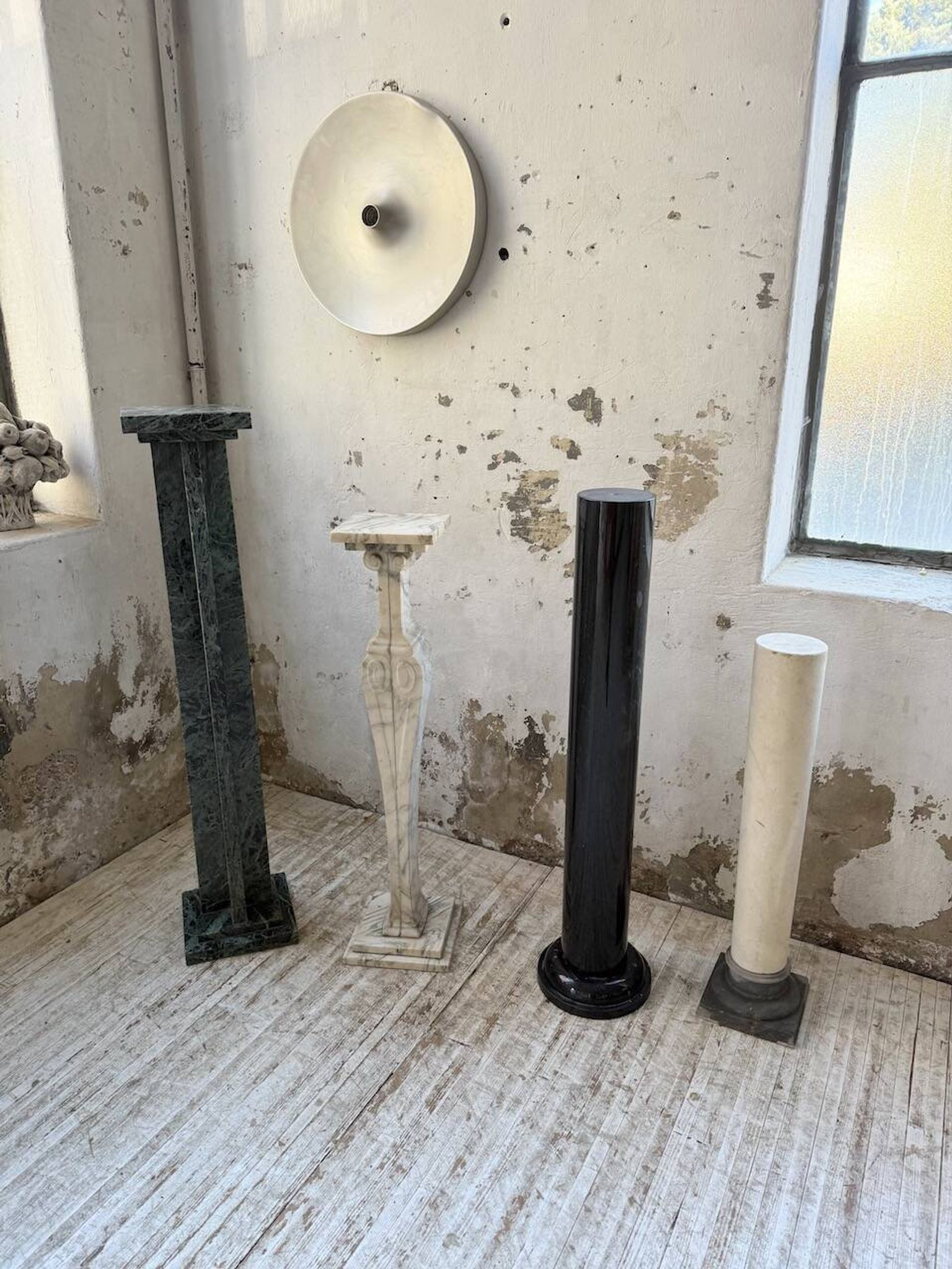 Set of 4 marble columns or pedestals.