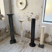 Set of 4 marble columns or pedestals.