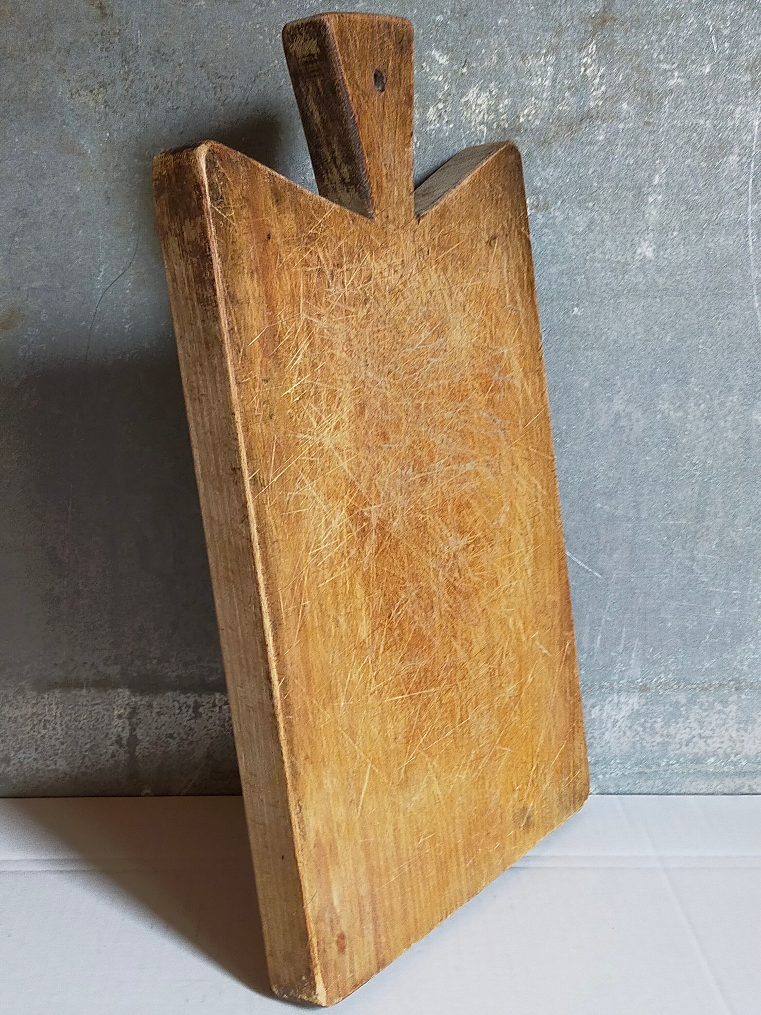 Cutting board in old solid wood
