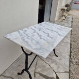 Antique marble and cast iron bistro restaurant table
