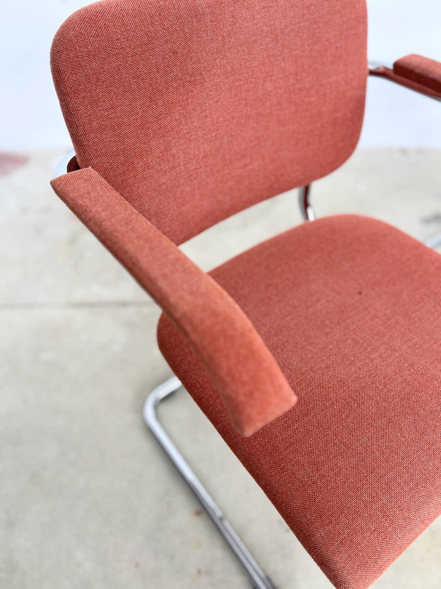 Pair of Marcel Breuer B64 Knoll armchairs in coral fabric