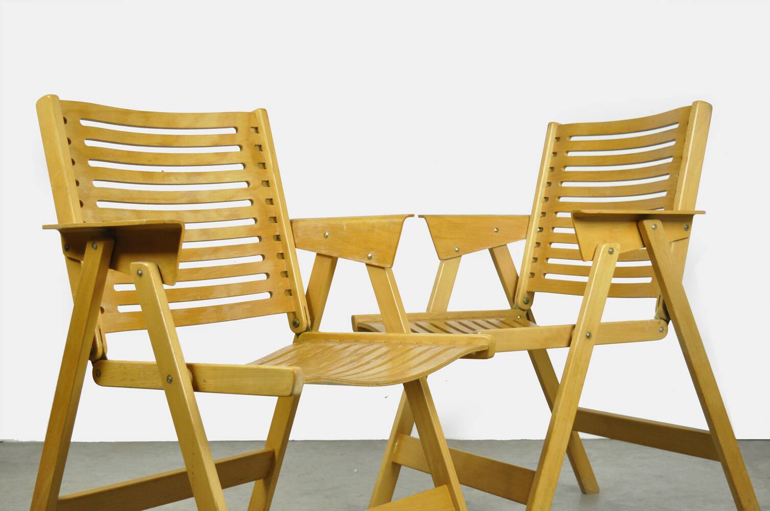 Original vintage foldable dining chairs by the Slovenian architect Niko Kralj (1920-2013) for Stol