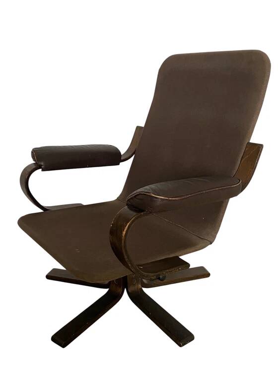 Vintage Scandinavian armchair in curved wood and leather
