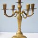 Solid brass candle holder with 5 candles and 4 arms