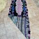 Vintage Berber Boucherouite hallway rug: Handwoven Moroccan rug.