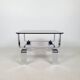 Table basse métal chromé et verre fumé 70
