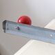 Wall-mounted coat rack, metal and colored wooden hook, 1960