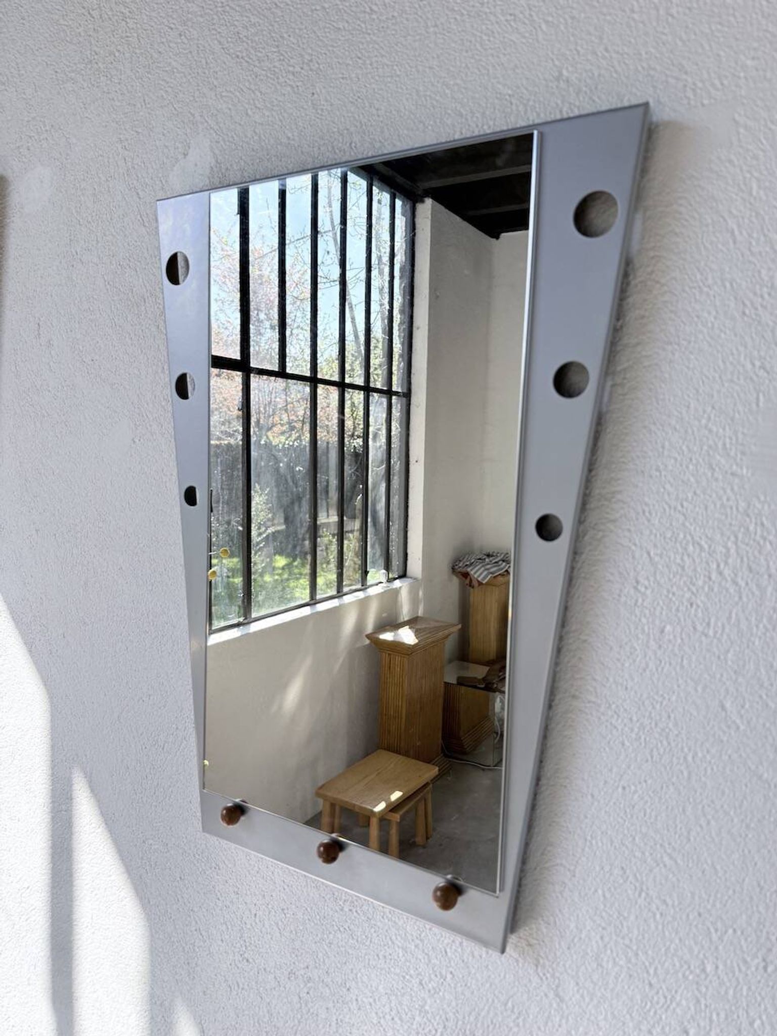 Pair of "Memphis" mirrors from the 80s in chrome and wood.