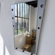 Pair of "Memphis" mirrors from the 80s in chrome and wood.