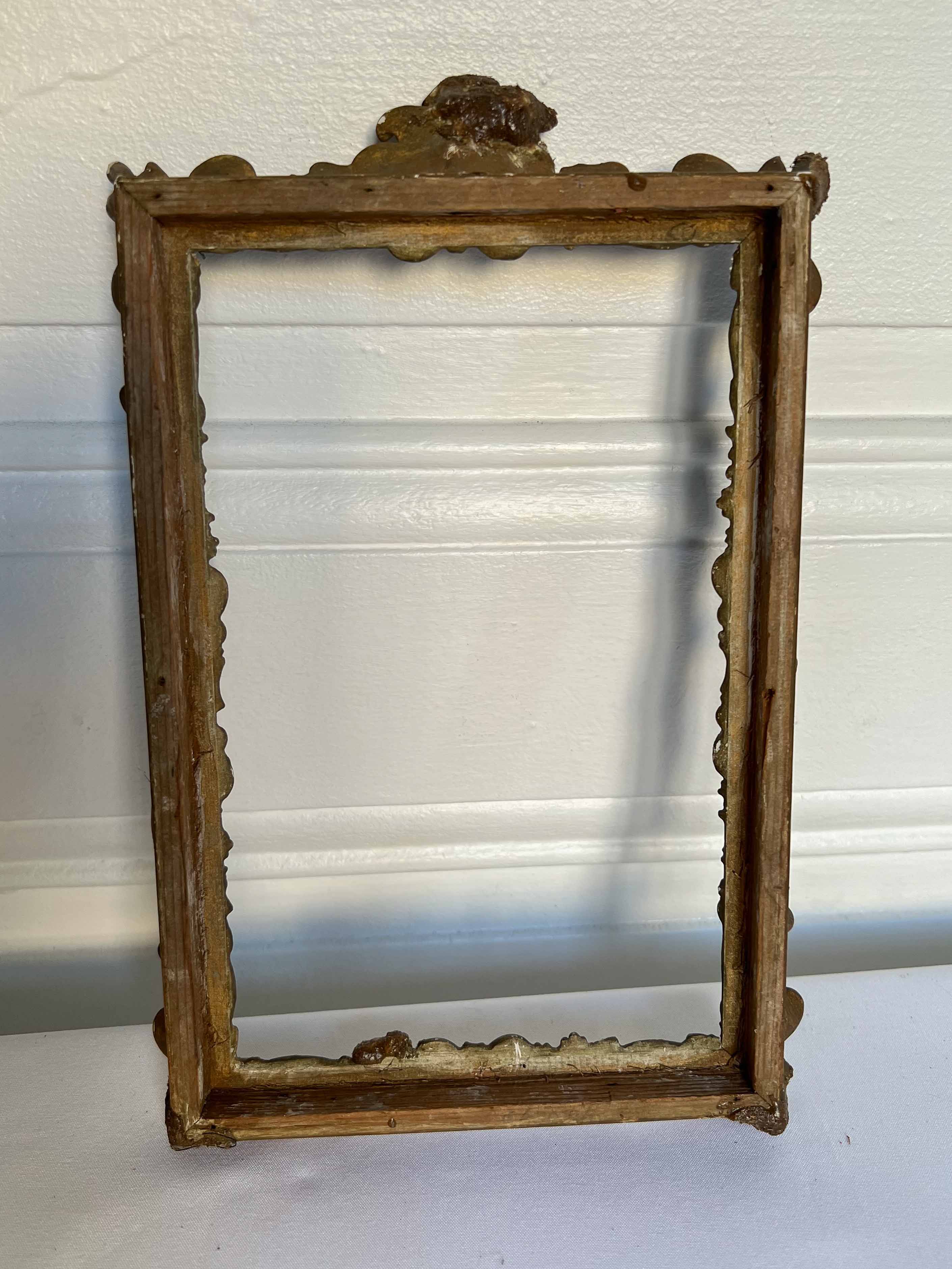Frame with moldings to restore