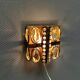Swedish wall lamp in gold-colored metal with glass prisms. Estimated 1970-80s.