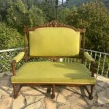 Richly carved solid wood bench in Louis XVI style.