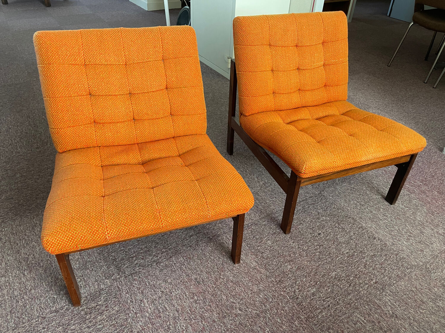 Pair of teak armchairs