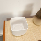 Vintage white flower pot with relief