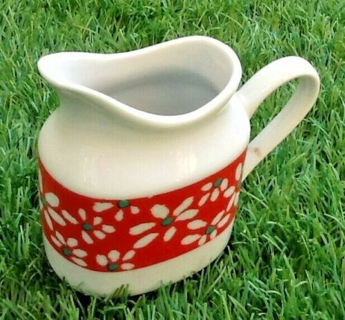 Suite of 6 coffee cups and milk pot, porcelain fine white with floral curly