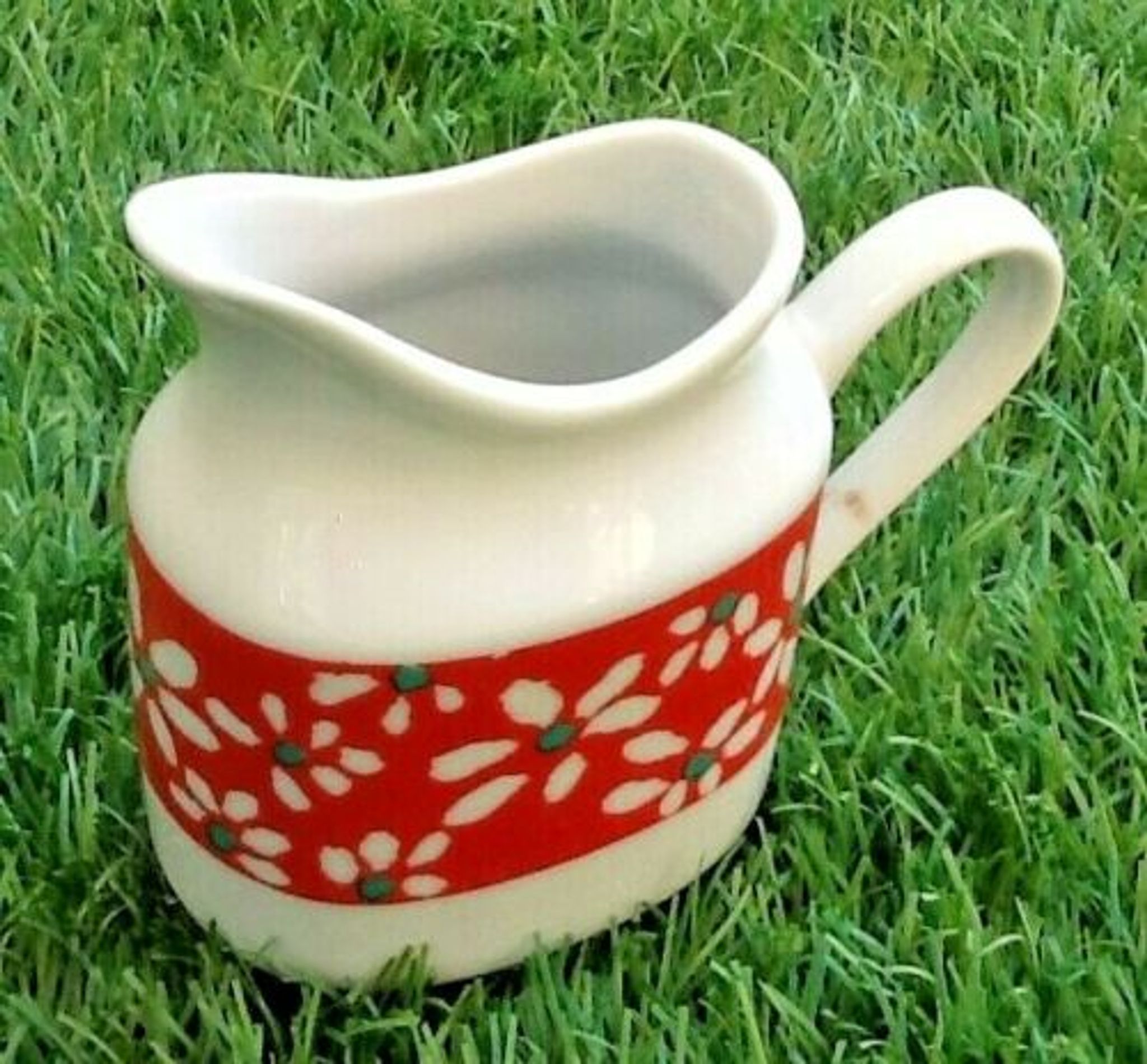 Suite of 6 coffee cups and milk pot, porcelain fine white with floral curly