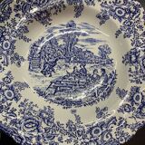 Set of 12 vintage B.P. plates from the 70s