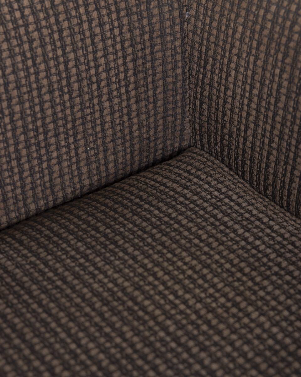 "Cubica" metal and fabric swivel armchair designed by Verzelloni