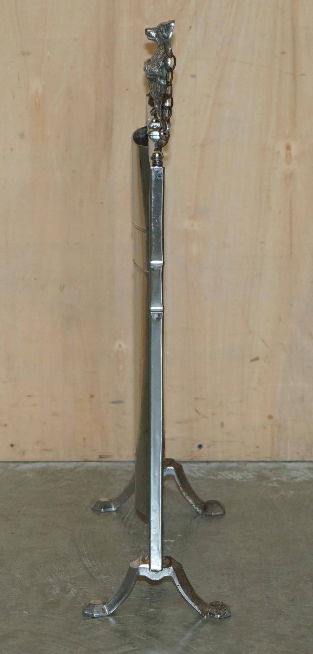Art Deco fire screen from around 1920 in polished chrome with a bear.