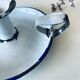 Antique candle holder in white and blue enamelled metal