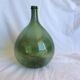 Ancienne “dame jeanne” en verre soufflé,vert bouteille