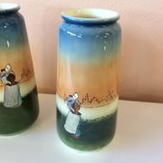 Pair of enamelled sandstone vases
