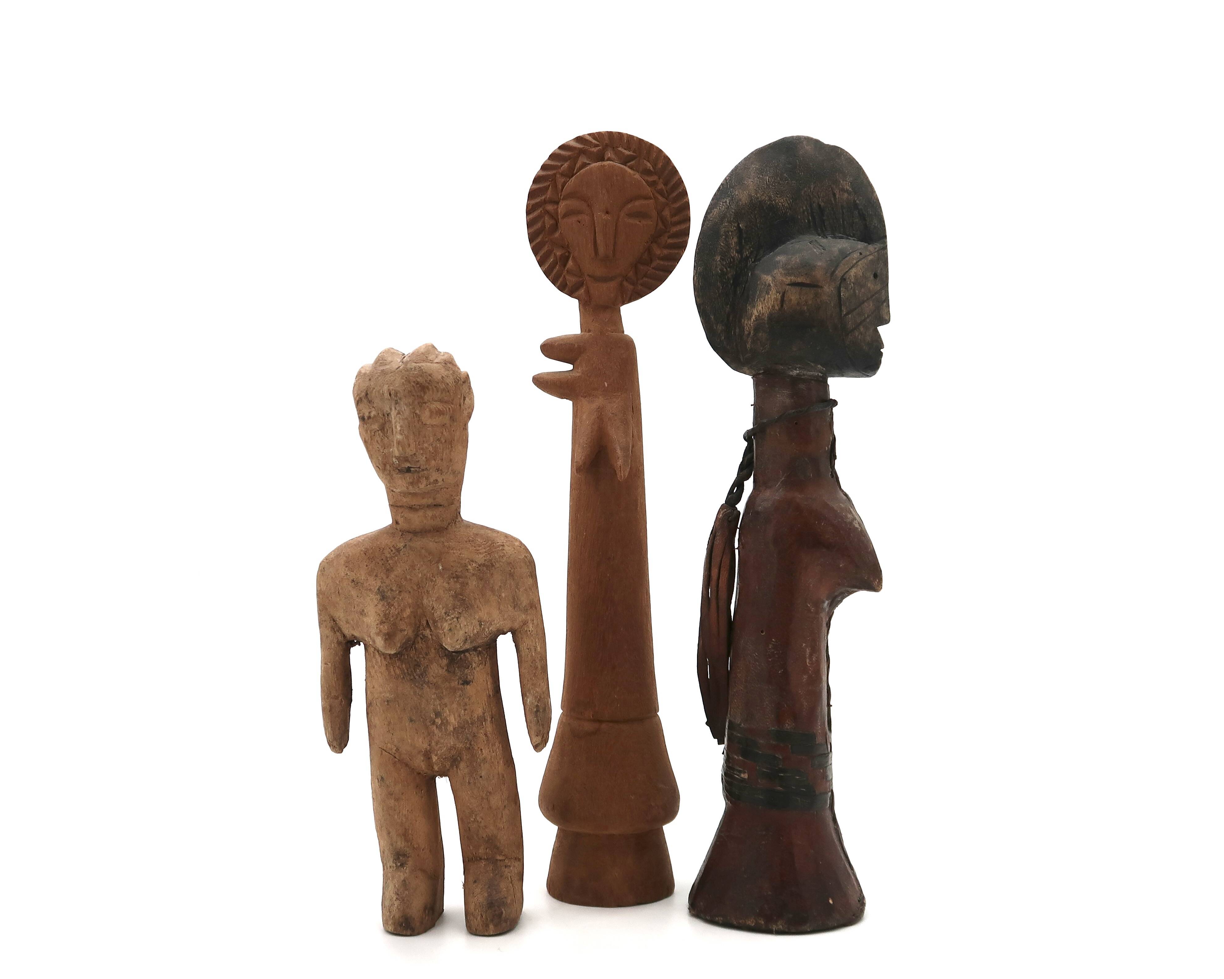 Set of three wooden tribal art statuettes, 1980s