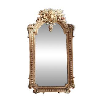 Gilded mirror signed Vincenzo Fancelli