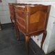 Pair of Louis XV style bedside tables in cherry wood marquetry.