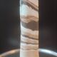 Turned stoneware vase signed with relief decoration.
