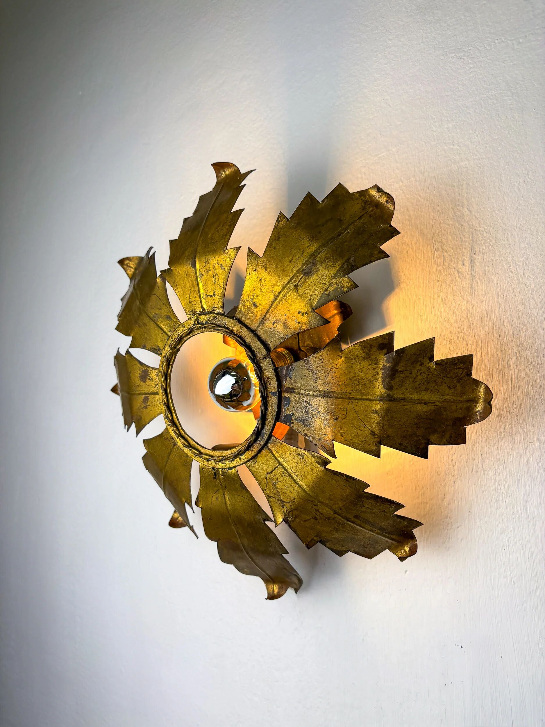 Spanish sunburst flush mount light fixture in gilt iron, circa 1970s