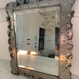 Eventful beveled mirror and openwork period 1900 repelled tin decoration