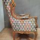 Bergere à oreilles en bois sculpté de style régence