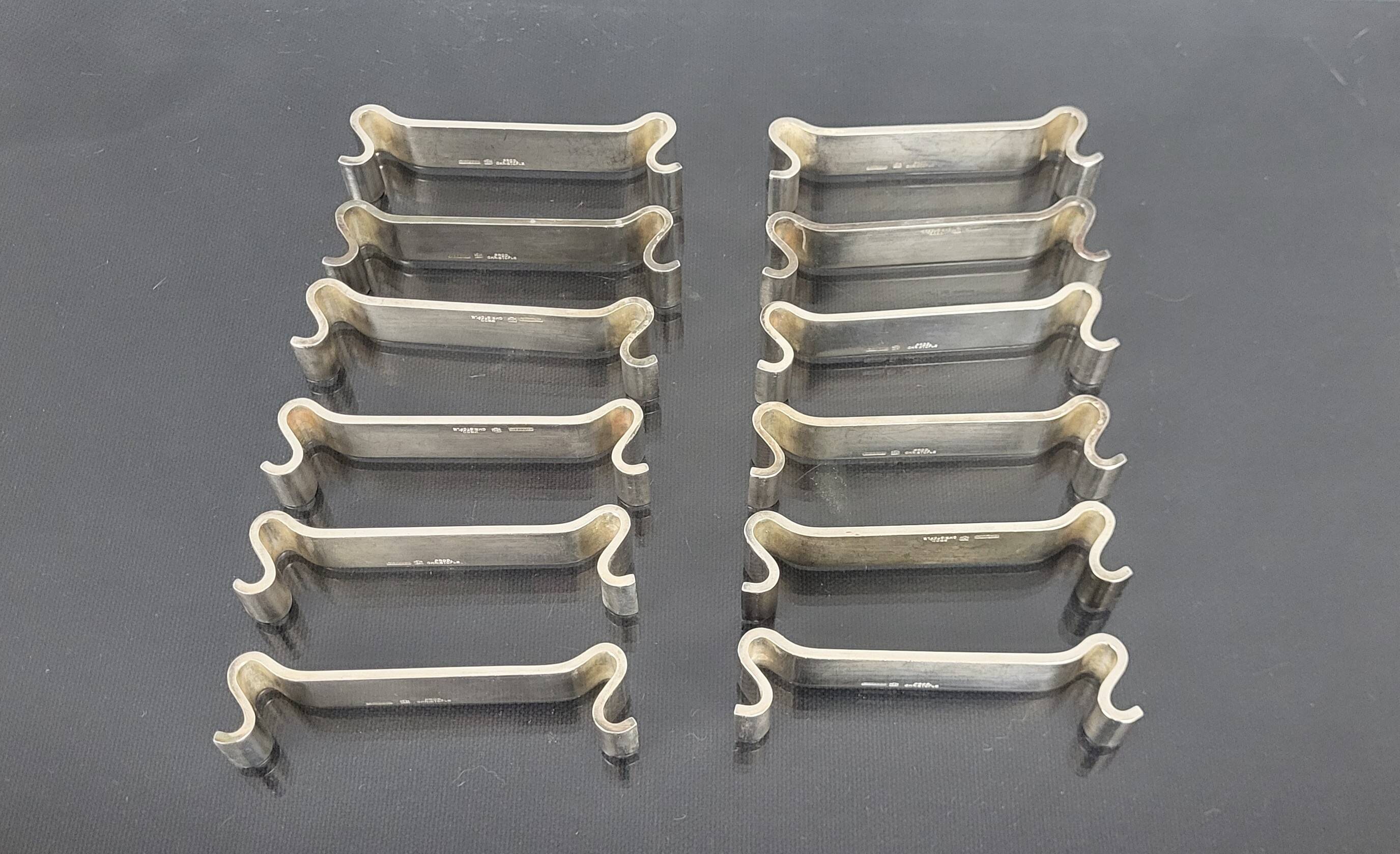 12 Christofle Gallia knife holders