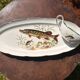 Large fish platter and its vintage porcelain sauce boat, decorated with pike.